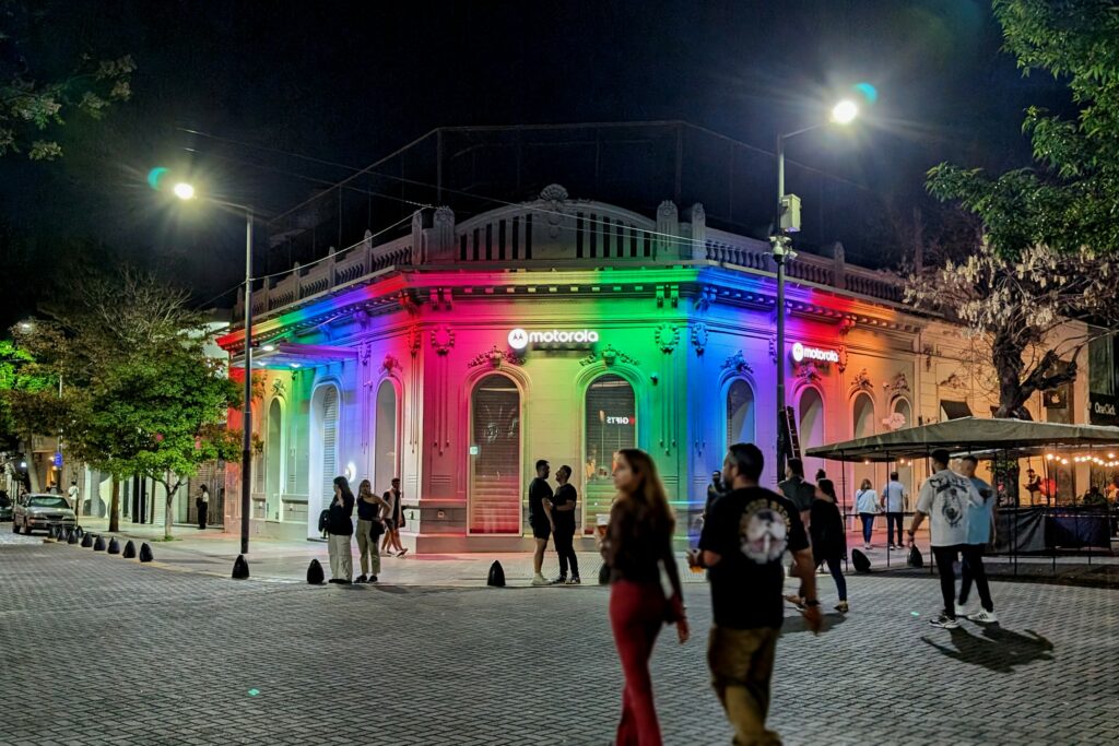 Corner in Palermo Soho that is lit with a rainbow of lights to celebrate Pride in Buenos Aires