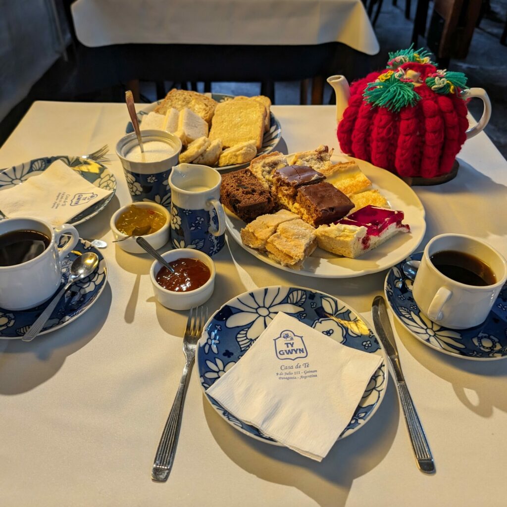Biscuits, tea pot, and place setting at High Tea