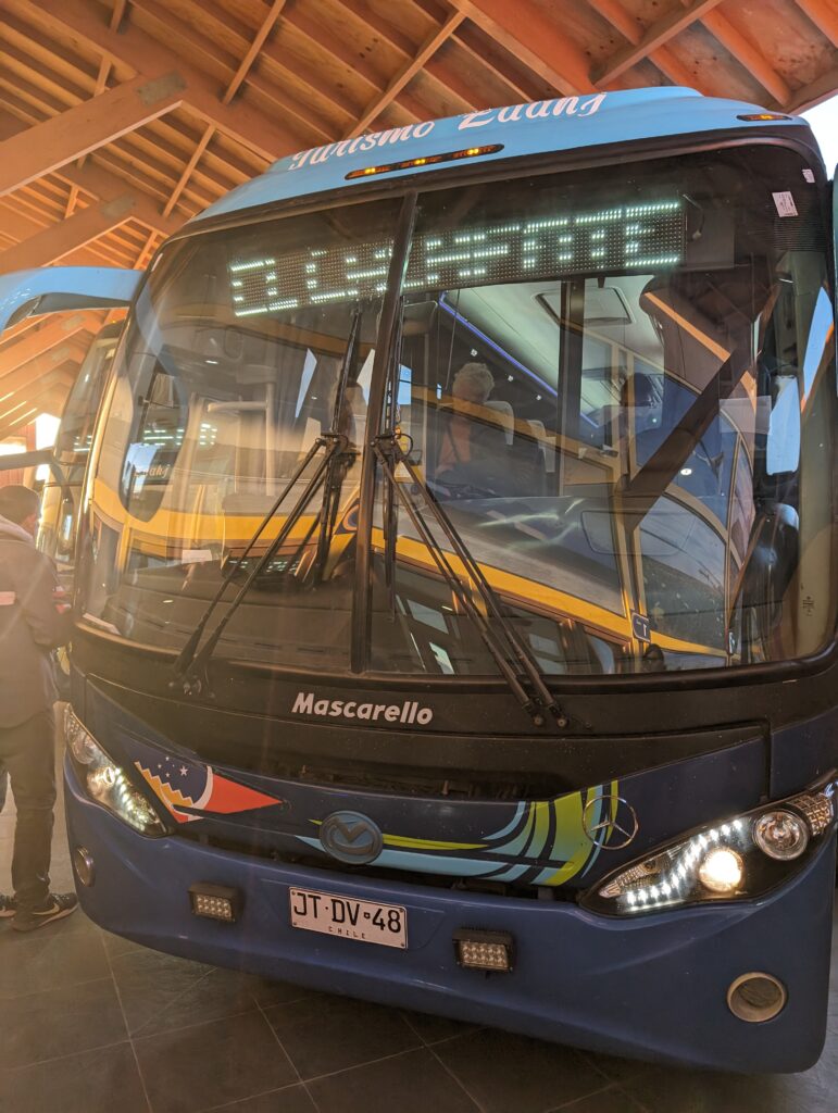 Bus at a bus station with the destination of El Calafate