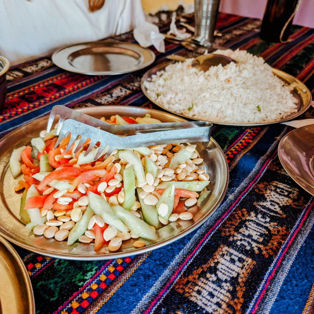 A plate full of beans and rice for a meal during the Lares Trek