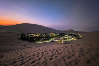 An oasis in the middle of a desert on a trip to Huacachina and Paracas